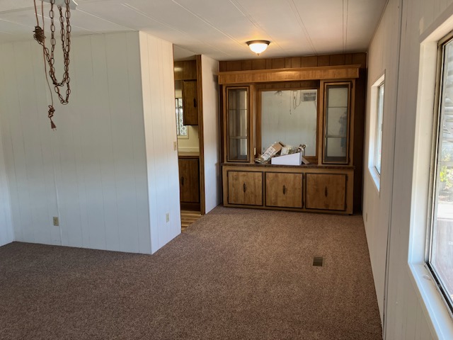 Living room with built-in wood cabinet in 55+ mobile home, Rancho Exeter, Exeter CA