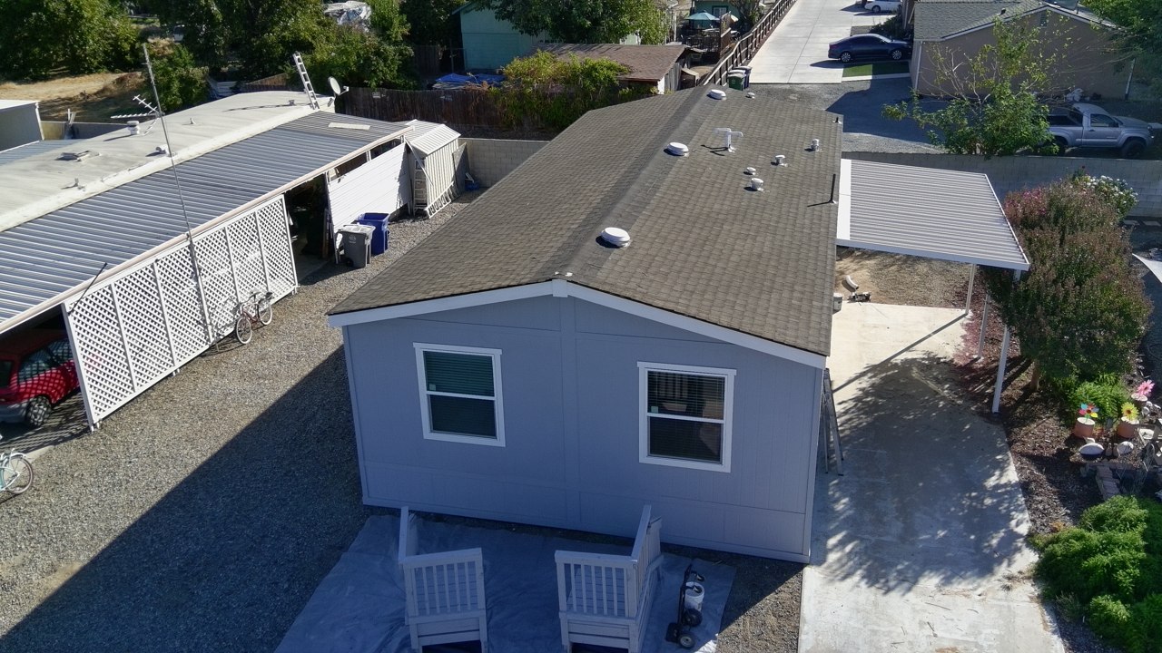 Exterior of Space 97 with its front porch and covered driveway