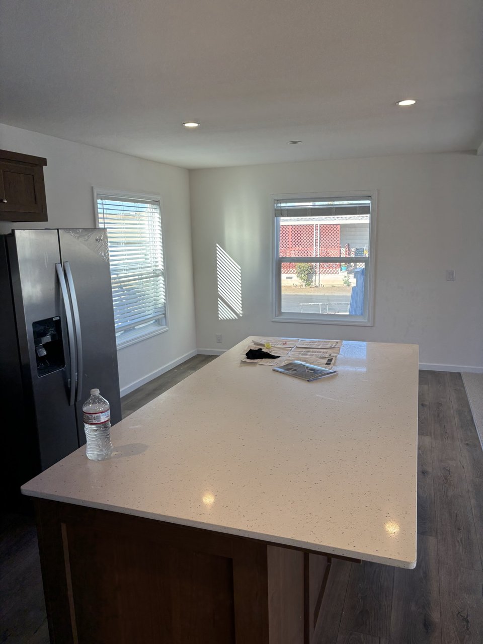 Kitchen island and open view toward the living area